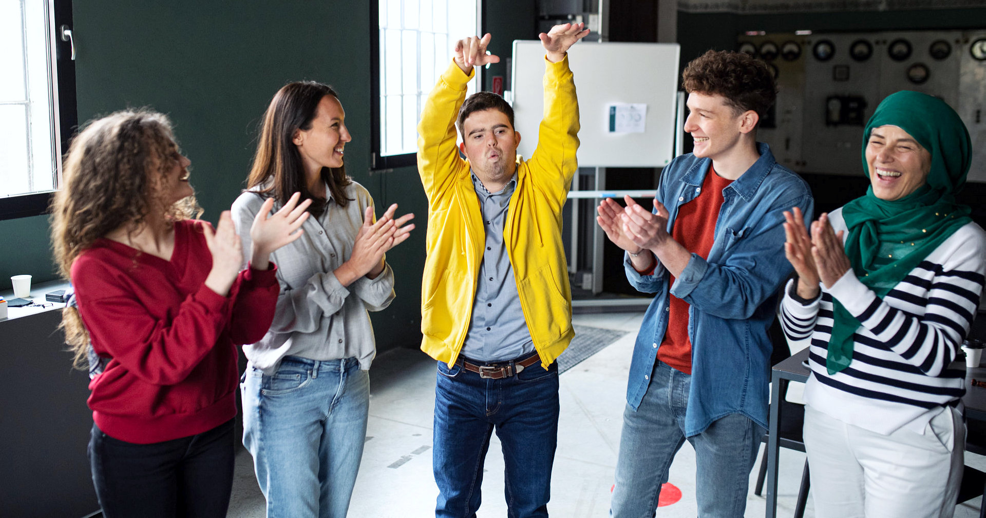 group of people cheering